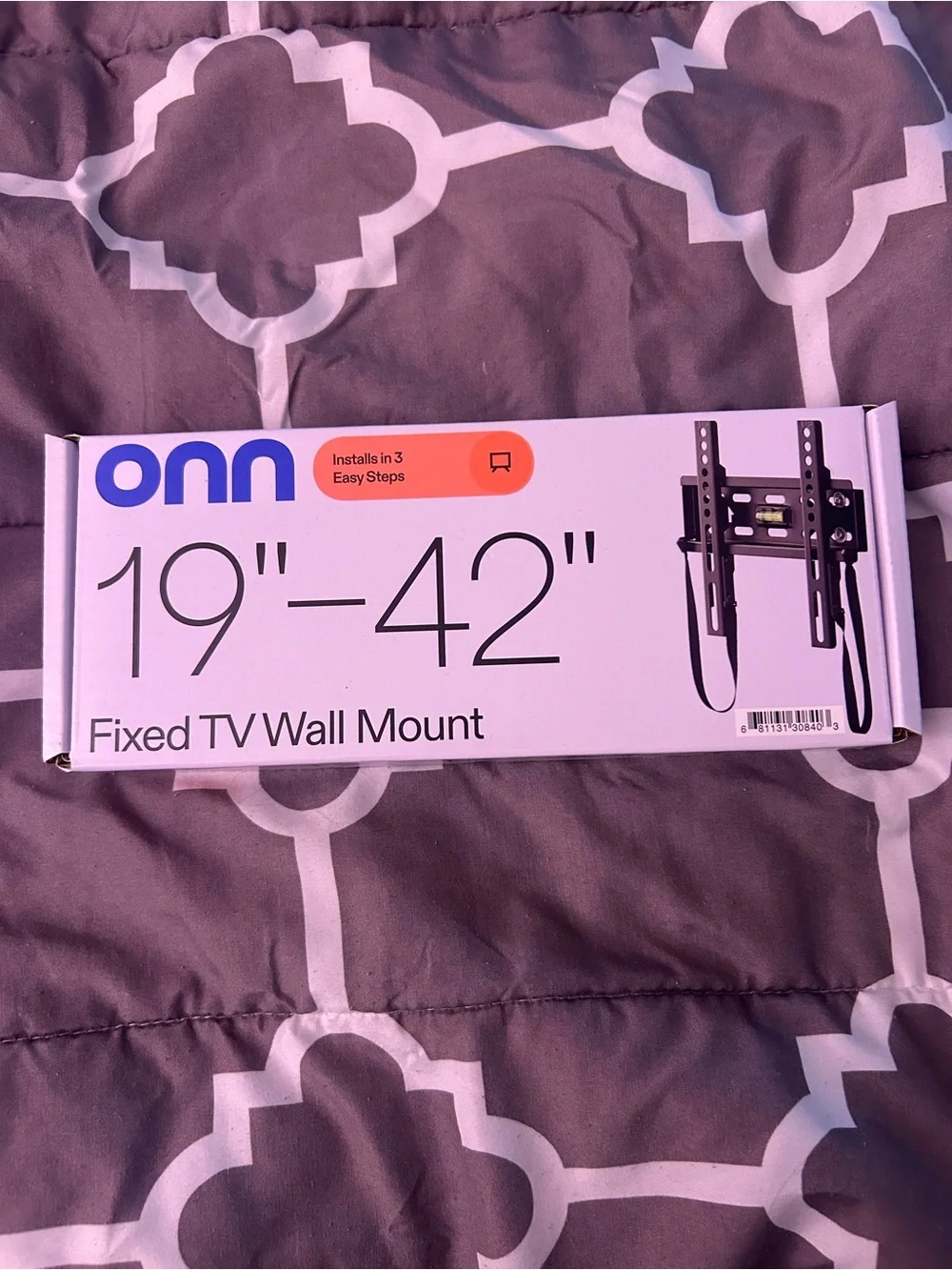Onn Fixed TV Wall Mount in Black and White Packaging